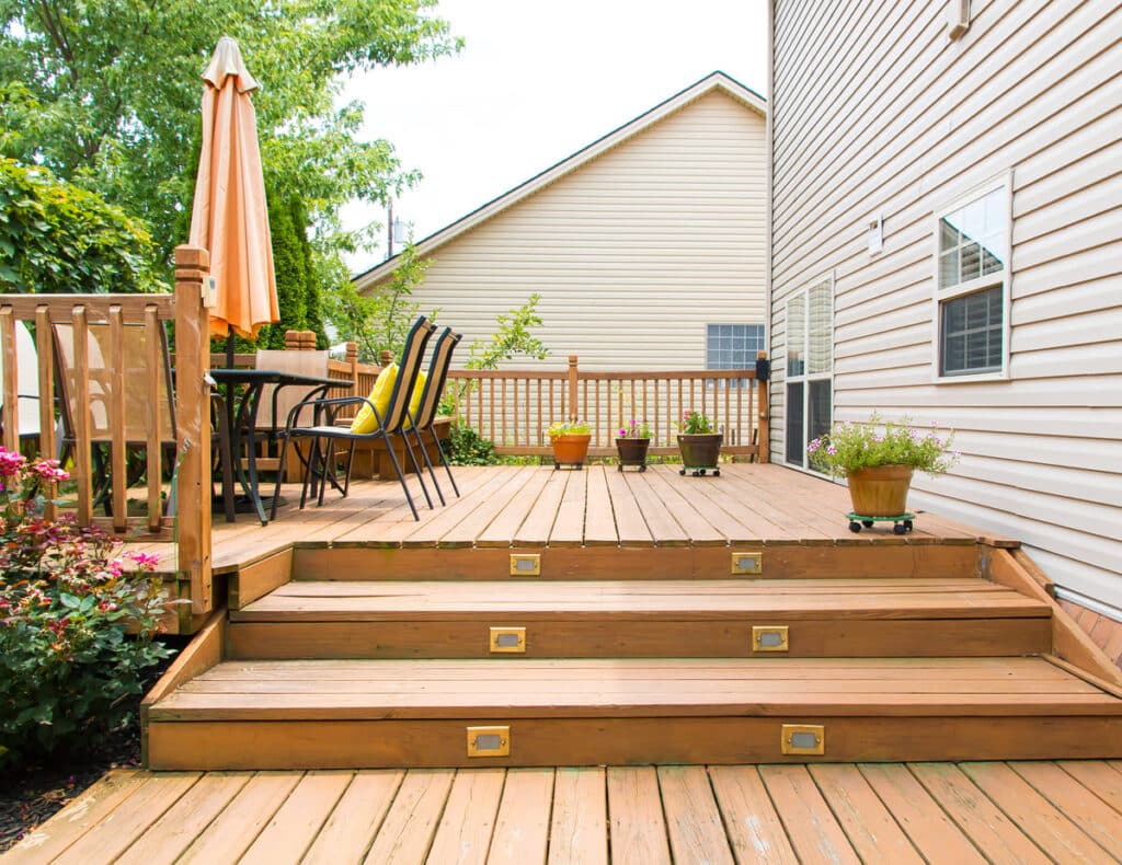 beautiful backyard deck built with premium decking materials