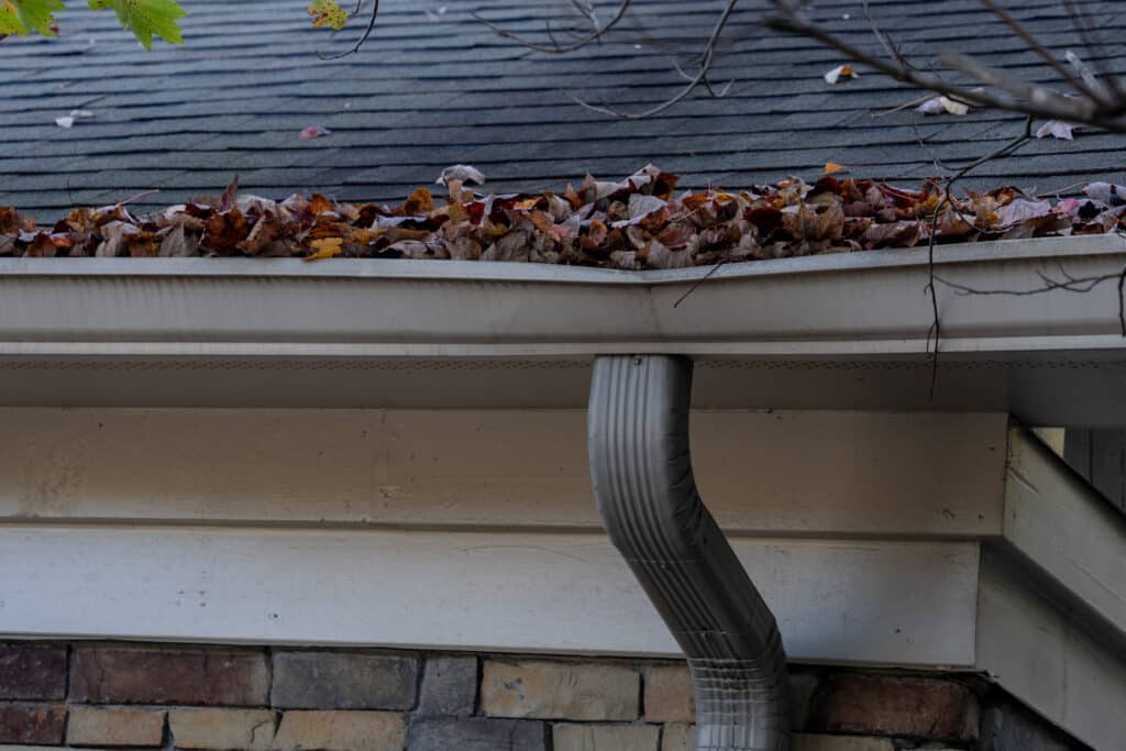 - A residential home with clogged gutters